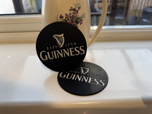 Guinness beer coaster - beer,